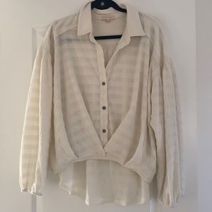 Worn once cute new season style blouse.